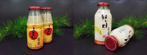 (평양 조선신보=연합뉴스) 재일본조선인총연합회 기관지 조선신보는 북한 내 음료 생산·판매 1위라는 '오일건강음료종합공장'이 만드는 음료를 7일 소개했다. 사진은 공장에서 생산하는 홍차우유(왼쪽)와 현미우유. 2021.11.7 [국내에서만 사용가능. 재배포 금지. For Use Only in the Republic of Korea. No Redistribution]