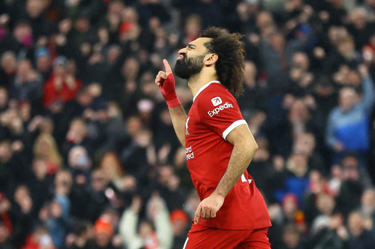 Soccer Football - Premier League - Liverpool v Newcastle United - Anfield, Liverpool, Britain - January 1, 2024 Liverpool's Mohamed Salah celebrates scoring their fourth goal REUTERS/Carl Recine NO USE WITH UNAUTHORIZED AUDIO, VIDEO, DATA, FIXTURE LISTS, CLUB/LEAGUE LOGOS OR 'LIVE' SERVICES. ONLINE IN-MATCH USE LIMITED TO 45 IMAGES, NO VIDEO EMULATION. NO USE IN BETTING, GAMES OR SINGLE CLUB/LEAGUE/PLAYER PUBLICATIONS.