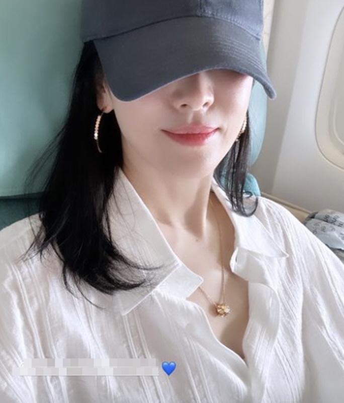 송혜교, 조용한 공항行..모자 깊숙이 눌러써도 '숨기지 못한 연예인 아우…
