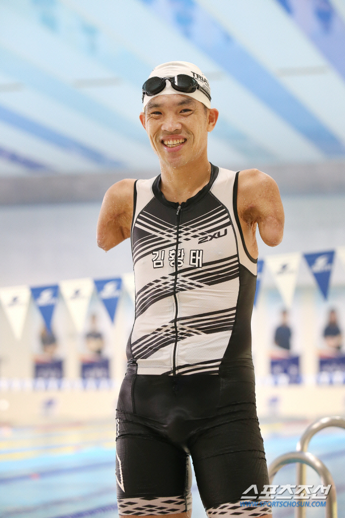 '우리시대 최고의 아이언맨'김황태,철인3종 사상 첫 패럴림픽 출전권 따냈…