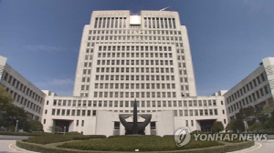 굿값 뜯으려 전 남편 때려 살해 40대女, 징역 30년 확정
