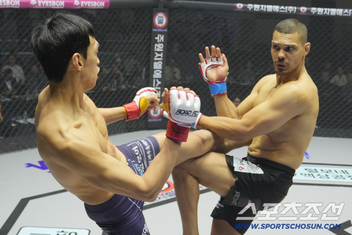 미들킥 한방에 브라질 강자가 쓰러지다. 윤태영 로드FC 웰터급 초대 챔피…