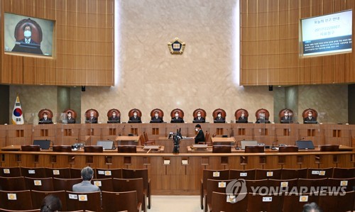 '기무사 댓글공작' MB정부 비서관들 유죄 징역형 집유 확정