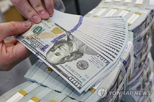 달러-원, 이란 美 물밑 접촉설에 하락 전환…1,462.90원 마감