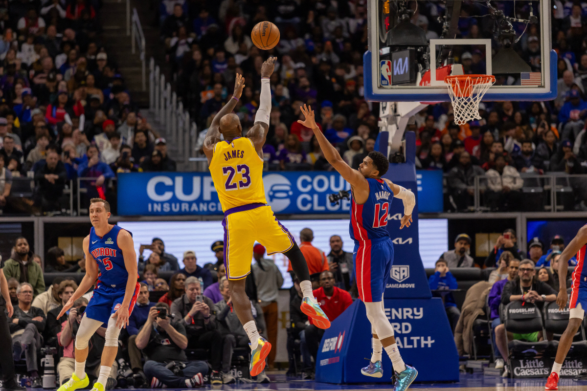 Mar 23, 2026; Detroit, Michigan, USA; Los Angeles Lakers LeBron James (23) shoots the ball over Detroit Pistons Tobias Harris (12) during the second half at Little Caesars Arena. Mandatory Credit: David Reginek-Imagn Images