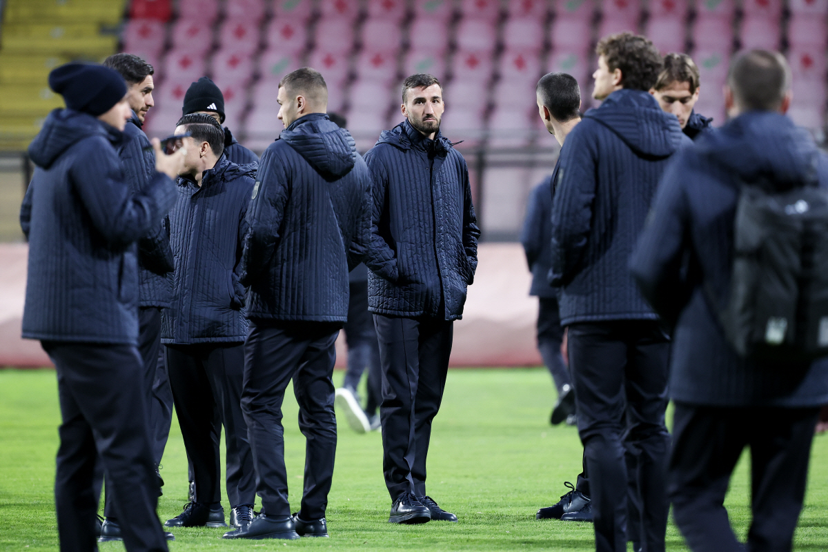 Italy's Bryan Cristante walks on the pitch ahead of Tuesday's World Cup playoff final soccer match against Bosnia, at the Bilino Polje stadium, in Zenica, Bosnia, Monday, March 30, 2026. (AP Photo/Armin Durgut)