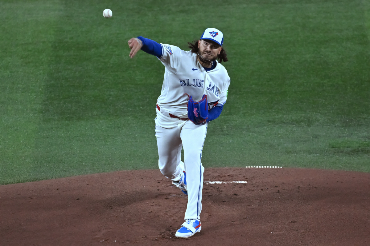 Toronto Blue Jays pitcher Cody Ponce (66) throws to a Colorado Rockies batter in the first inning of interleague baseball in Toronto, Monday, March 30, 2026. (Jon Blacker/The Canadian Press via AP) MANDATORY CREDIT