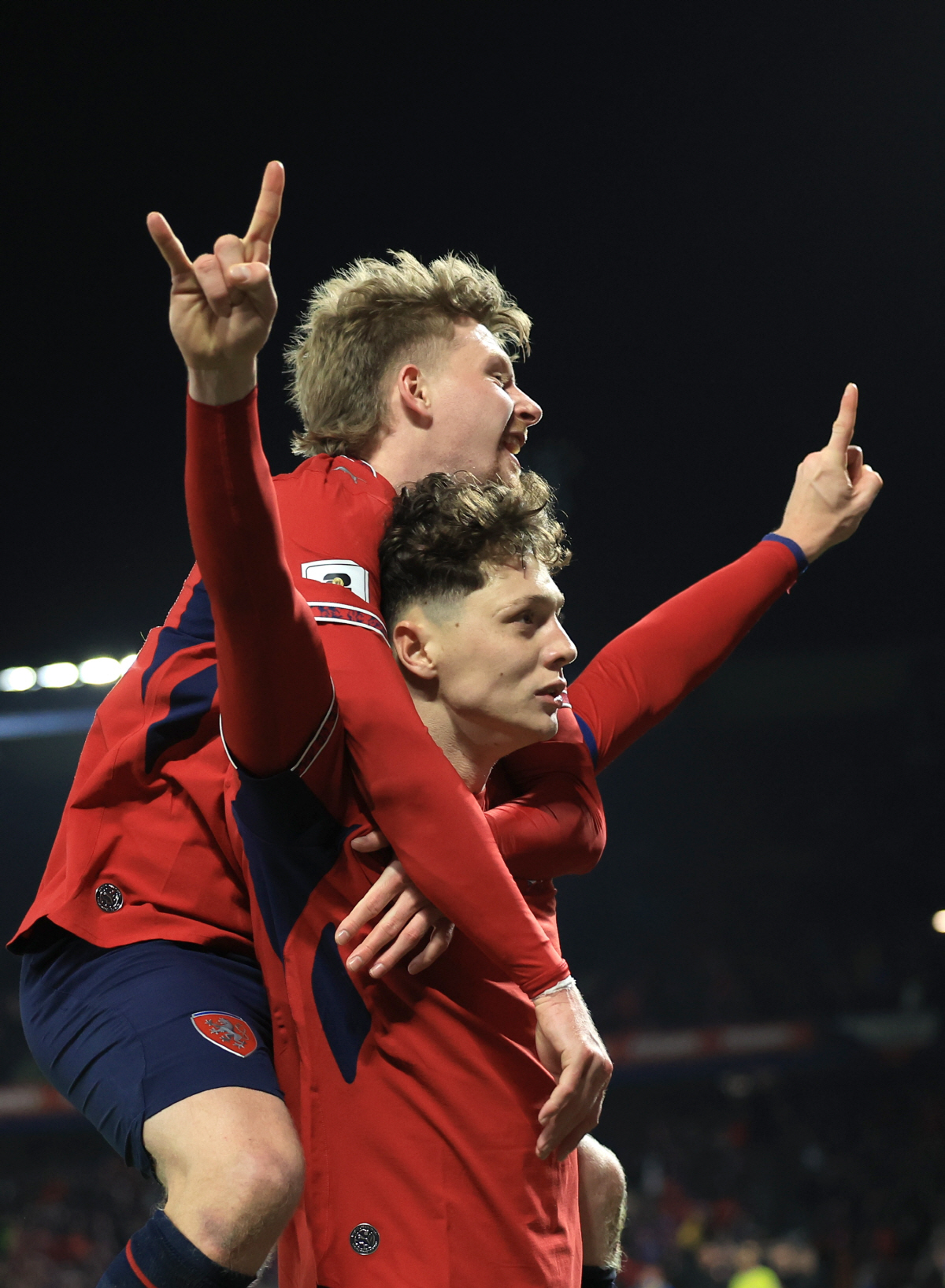 epa12862941 Czech Republic's Ladislav Krejci (down) celebrates after scoring the 2-1 goal during the FIFA World Cup 2026 European playoff match between the Czech Republic and Denmark in Prague, Czech Republic, 31 March 2026. EPA/MARTIN DIVISEK
