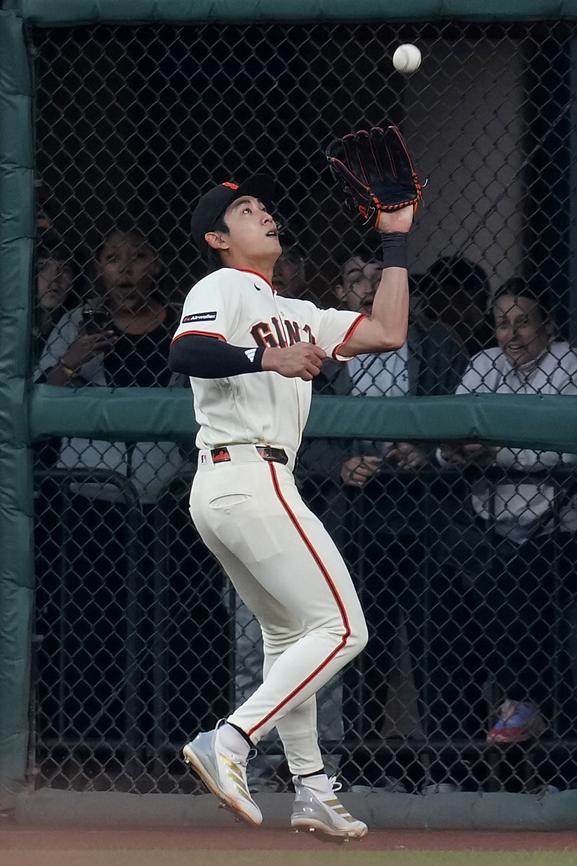 Mar 25, 2026; San Francisco, California, USA; San Francisco Giants outfielder Jung Hoo Lee (51) catches a fly ball against the New York Yankees in the sixth inning at Oracle Park. Mandatory Credit: Cary Edmondson-Imagn Images