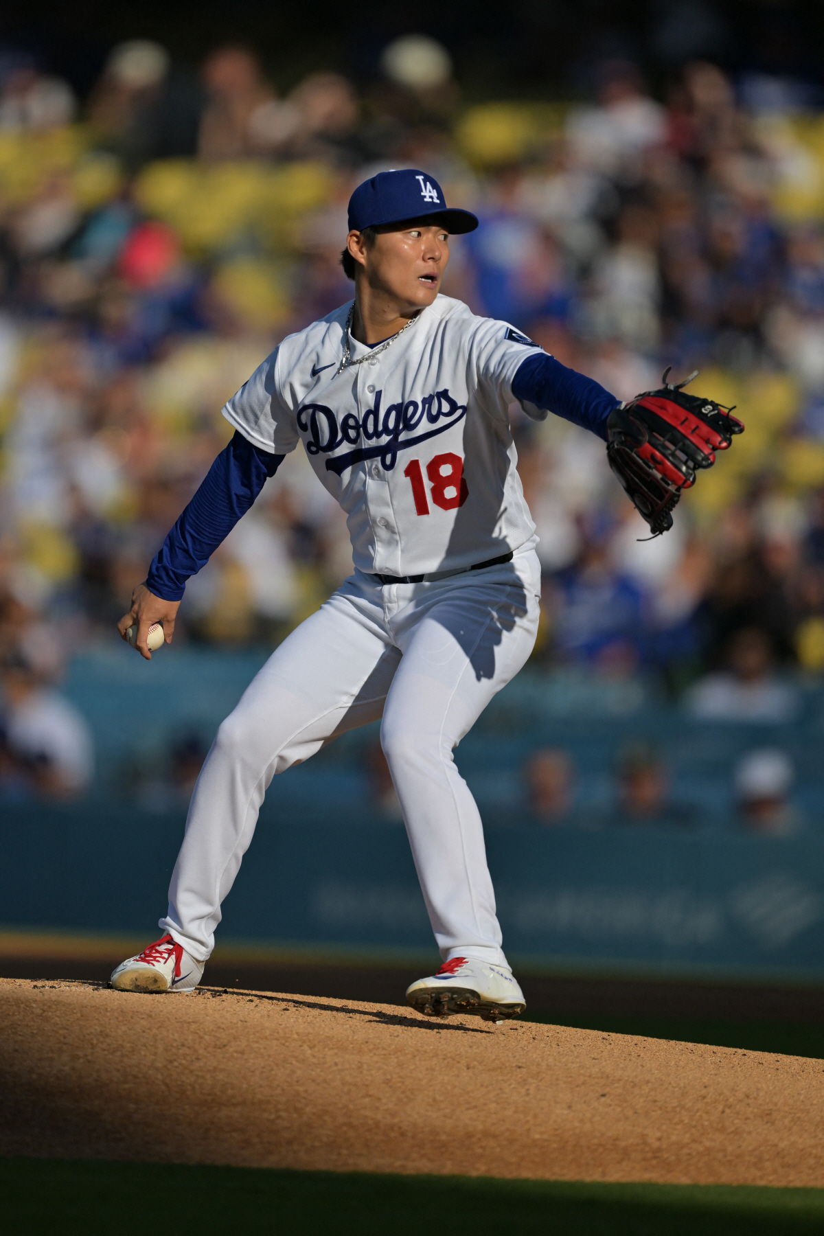 Apr 1, 2026; Los Angeles, California, USA; Los Angeles Dodgers starting pitcher Yoshinobu Yamamoto (18) delivers in the first inning against the Cleveland Guardians at Dodger Stadium. Mandatory Credit: Jayne Kamin-Oncea-Imagn Images