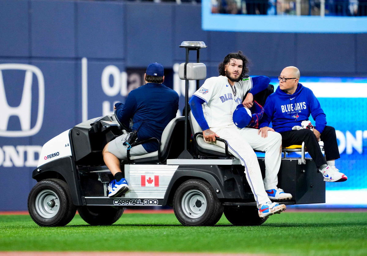 TORONTO, CANADA - MARCH 30: Cody Ponce #66 of the Toronto Blue Jays is carted off the field with an injury in a break in play against the Colorado Rockies during the third inning in their MLB game at the Rogers Centre on March 30, 2026 in Toronto, Ontario, Canada. AFP연합뉴스