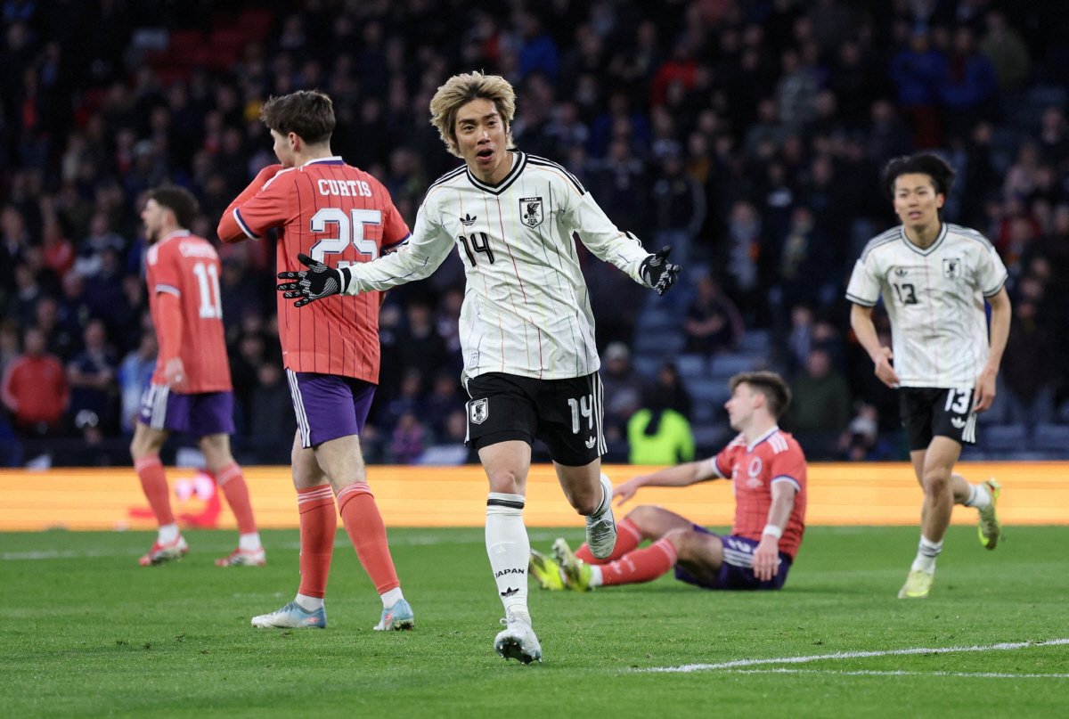 Soccer Football - International Friendly - Scotland v Japan - Hampden Park, Glasgow, Scotland, Britain - March 28, 2026 Japan's Junya Ito celebrates scoring their first goal REUTERS/Russell Cheyne TPX IMAGES OF THE DAY