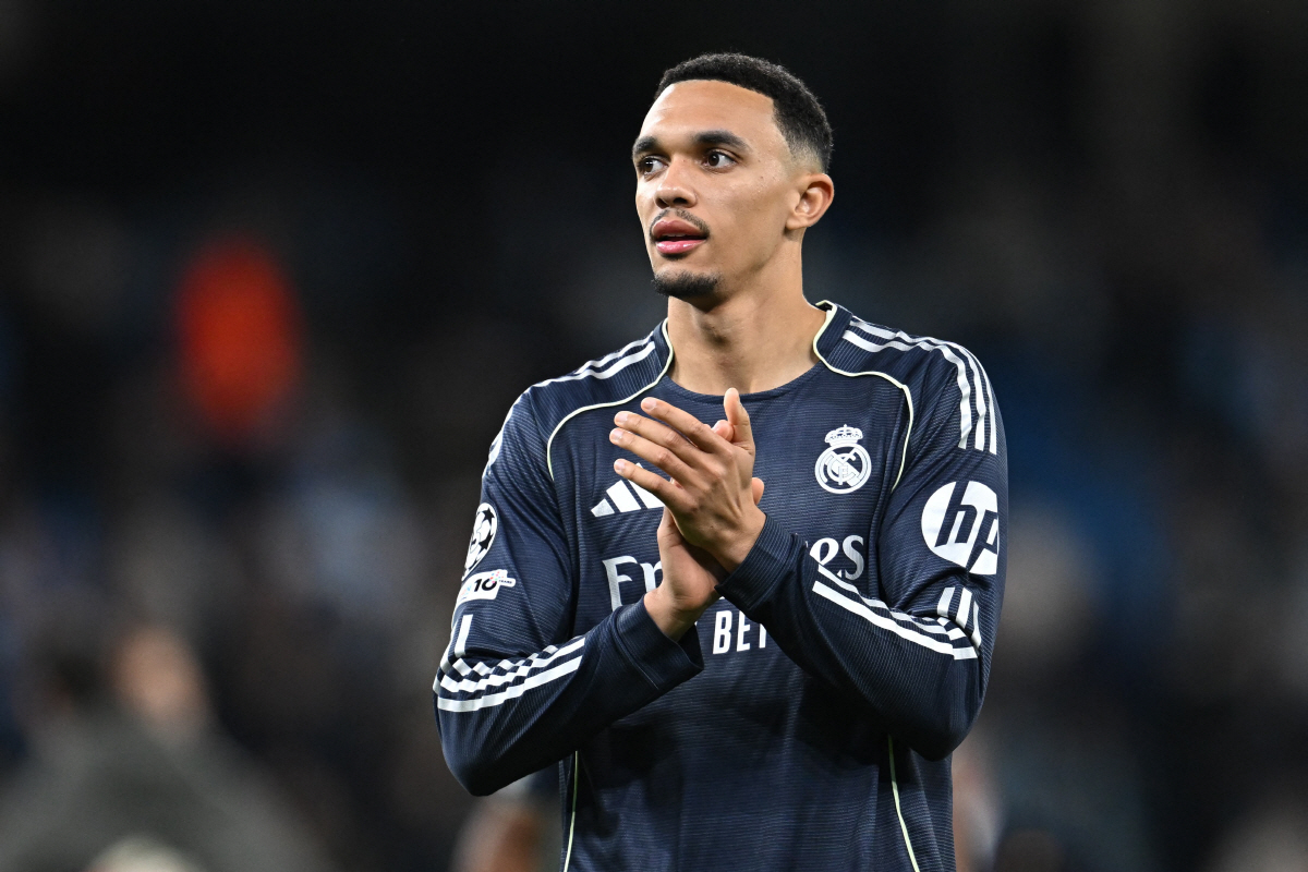 Real Madrid's English defender #12 Trent Alexander-Arnold applauds fans after the UEFA Champions League, round of 16 second leg football match between Manchester City and Real Madrid at the Etihad Stadium in Manchester, north west England, on March 17, 2026. Real Madrid won the game 2-1, and the tie 5-1 on aggregate. (Photo by Paul ELLIS / AFP)