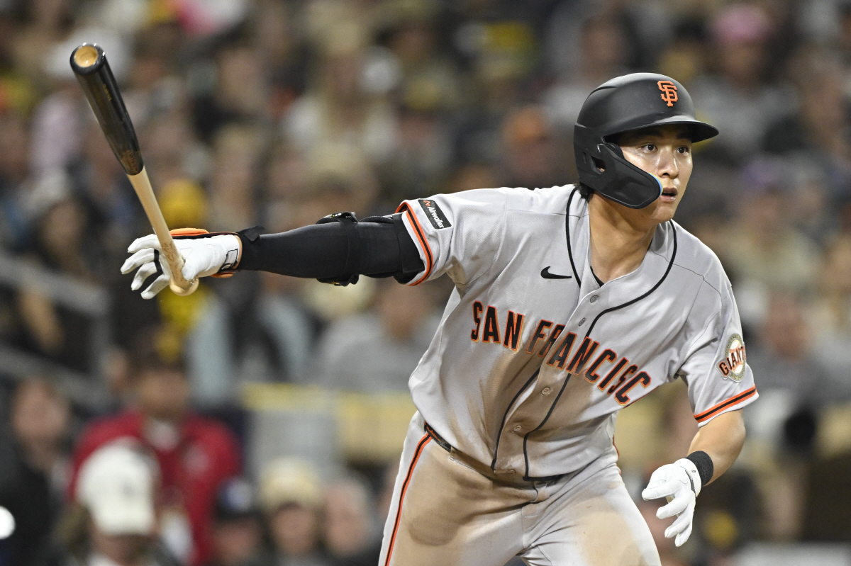Mar 31, 2026; San Diego, California, USA; San Francisco Giants right fielder Jung Hoo Lee (51) hits a double during the fifth inning against the San Diego Padres at Petco Park. Mandatory Credit: Denis Poroy-Imagn Images