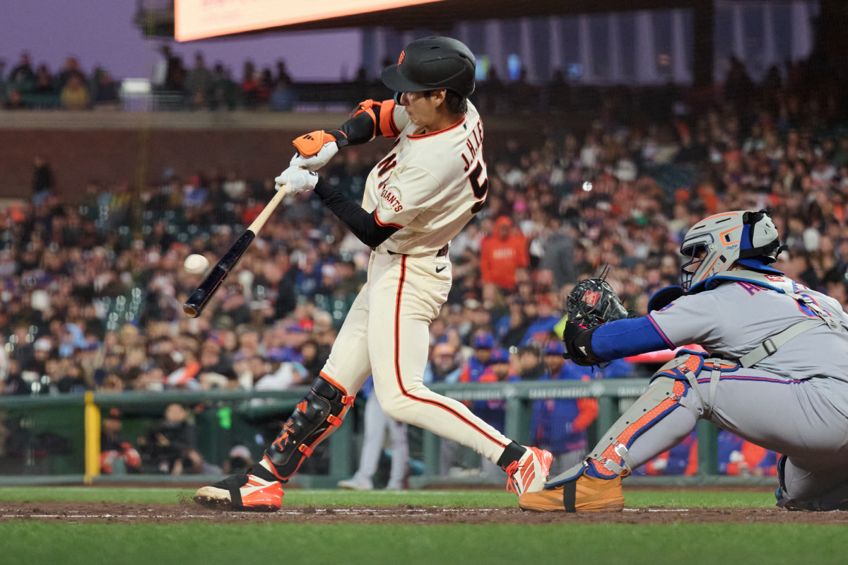 Apr 2, 2026; San Francisco, California, USA; San Francisco Giants outfielder Jung Hoo Lee (51) hits a one run RBI sacrifice fly against the New York Mets during the third inning at Oracle Park. Mandatory Credit: Robert Edwards-Imagn Images