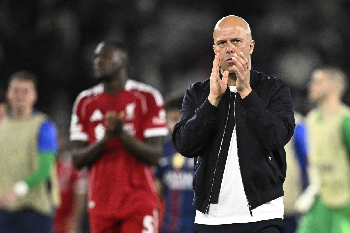 Liverpool's Dutch coach Arne Slot reacts at the end of the UEFA Champions League quarter-final first leg football match between Paris Saint-Germain (PSG) and Liverpool FC at the Parc des Princes stadium in Paris on April 8, 2026. (Photo by JULIEN DE ROSA / AFP)