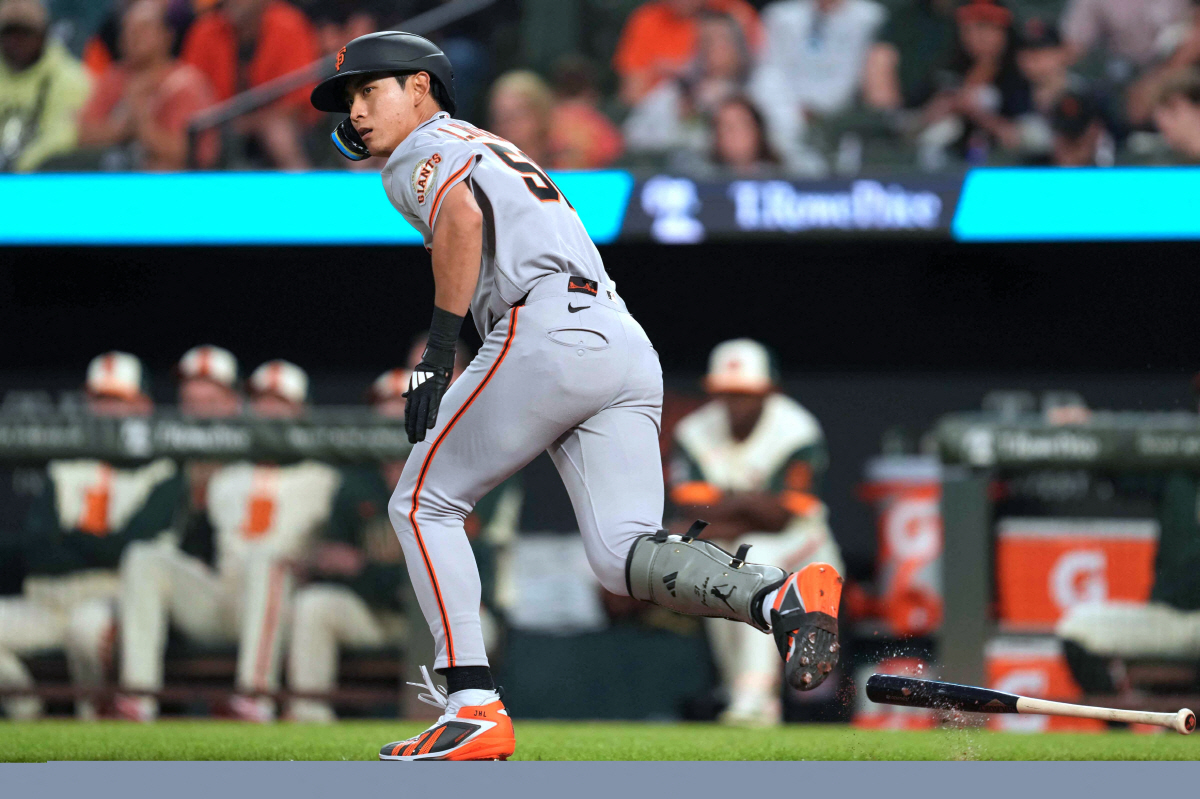 Apr 10, 2026; Baltimore, Maryland, USA; San Francisco Giants outfielder Jung Hoo Lee (51) doubles during the second inning against the Baltimore Orioles at Oriole Park at Camden Yards. Mandatory Credit: Mitch Stringer-Imagn Images