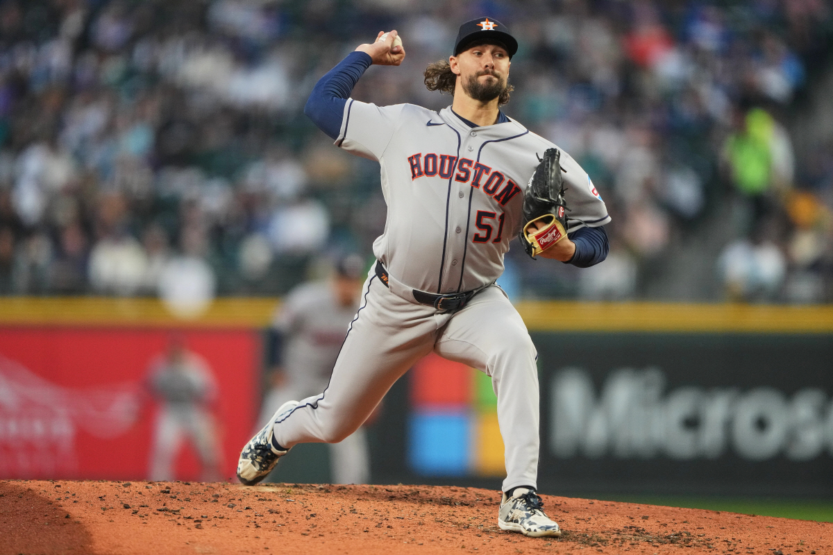 Houston Astros relief pitcher Ryan Weiss throws against the Seattle Mariners during the third inning of a baseball game, Friday, April 10, 2026, in Seattle. (AP Photo/Lindsey Wasson)