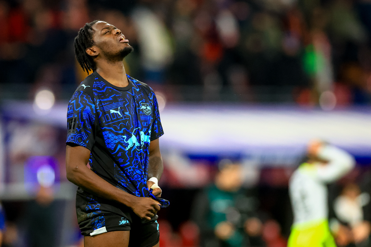 epa12766571 Castello Lukeba of Leipzig reacts after the German Bundesliga soccer match between RB Leipzig and Borussia Dortmund in Leipzig, Germany, 21 February 2026. EPA/MARTIN DIVISEK CONDITIONS - ATTENTION: The DFL regulations prohibit any use of photographs as image sequences and/or quasi-video.
