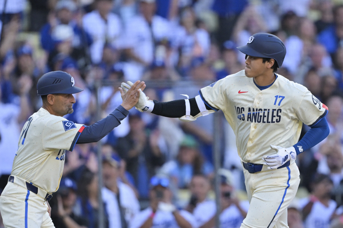Apr 11, 2026; Los Angeles, California, USA; Los Angeles Dodgers two-way player Shohei Ohtani (17) rounds the bases after hitting a solo home run against the Texas Rangers during the first inning at Dodger Stadium. Mandatory Credit: Jayne Kamin-Oncea-Imagn Images