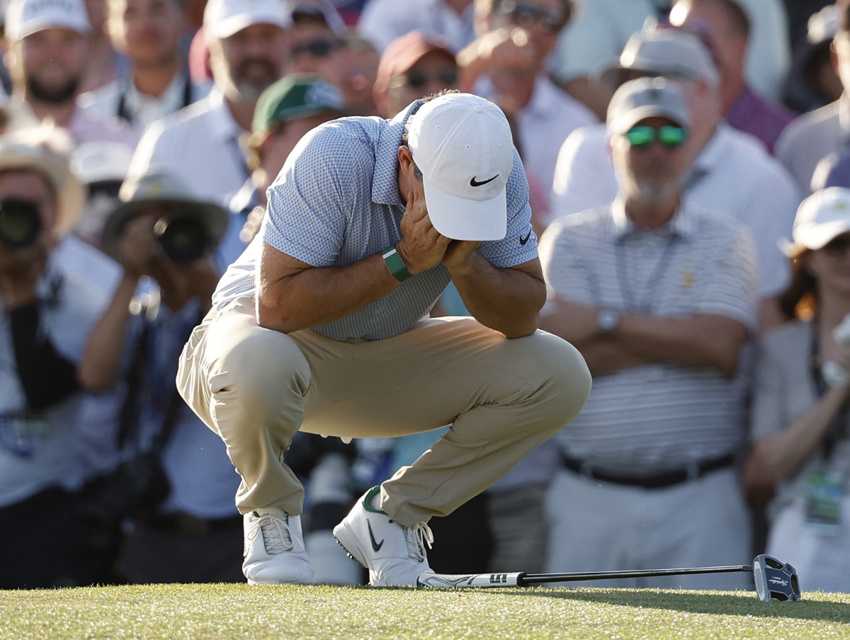Rory McIlroy of Northern Ireland reacts on the 18th green before his final putts on the final day of the 2026 Masters Tournament at Augusta National Golf Club on Sunday, April 12, 2026, in Augusta, Georgia. McIlroy won his second consecutive Masters with a 12-under-par four-day score of 276. Photo by John Angelillo/UPI