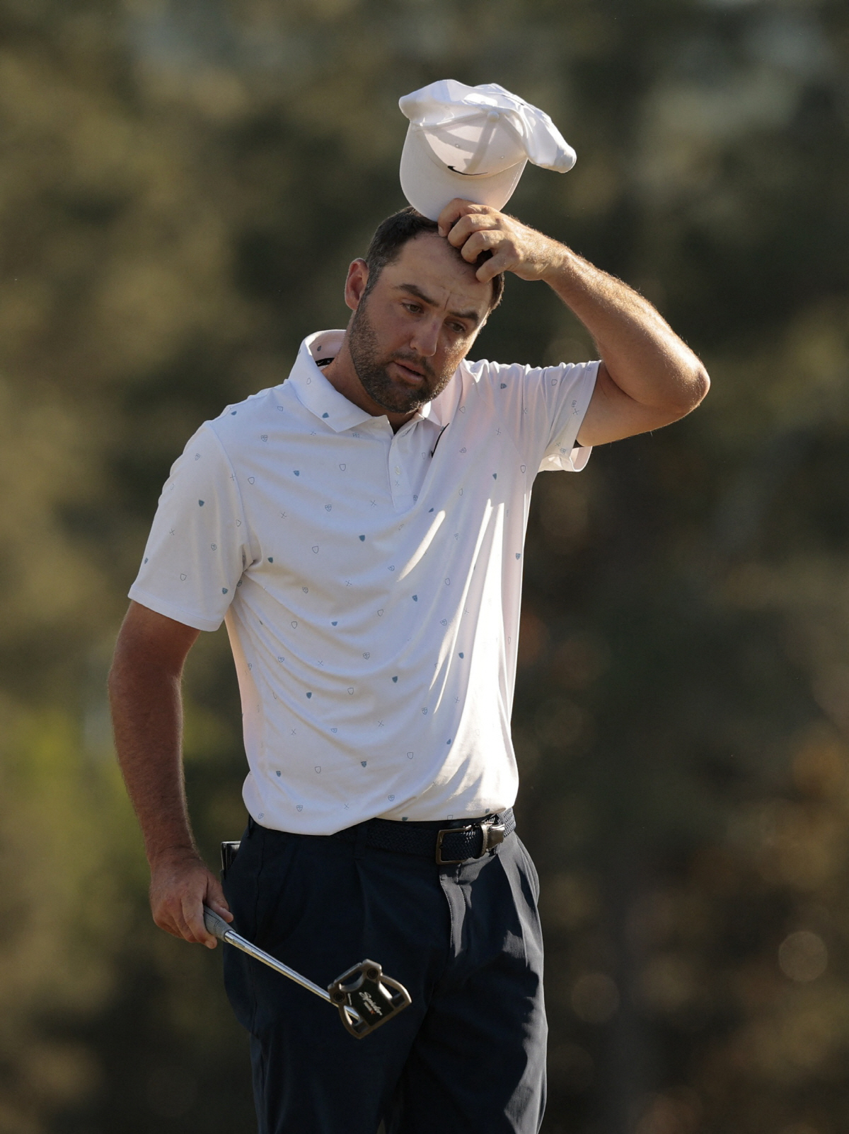 Golf - The Masters - Augusta National Golf Club, Augusta, Georgia, U.S. - April 12, 2026 Scottie Scheffler of the U.S. on the 18th hole after finishing his final round REUTERS/Brian Snyder