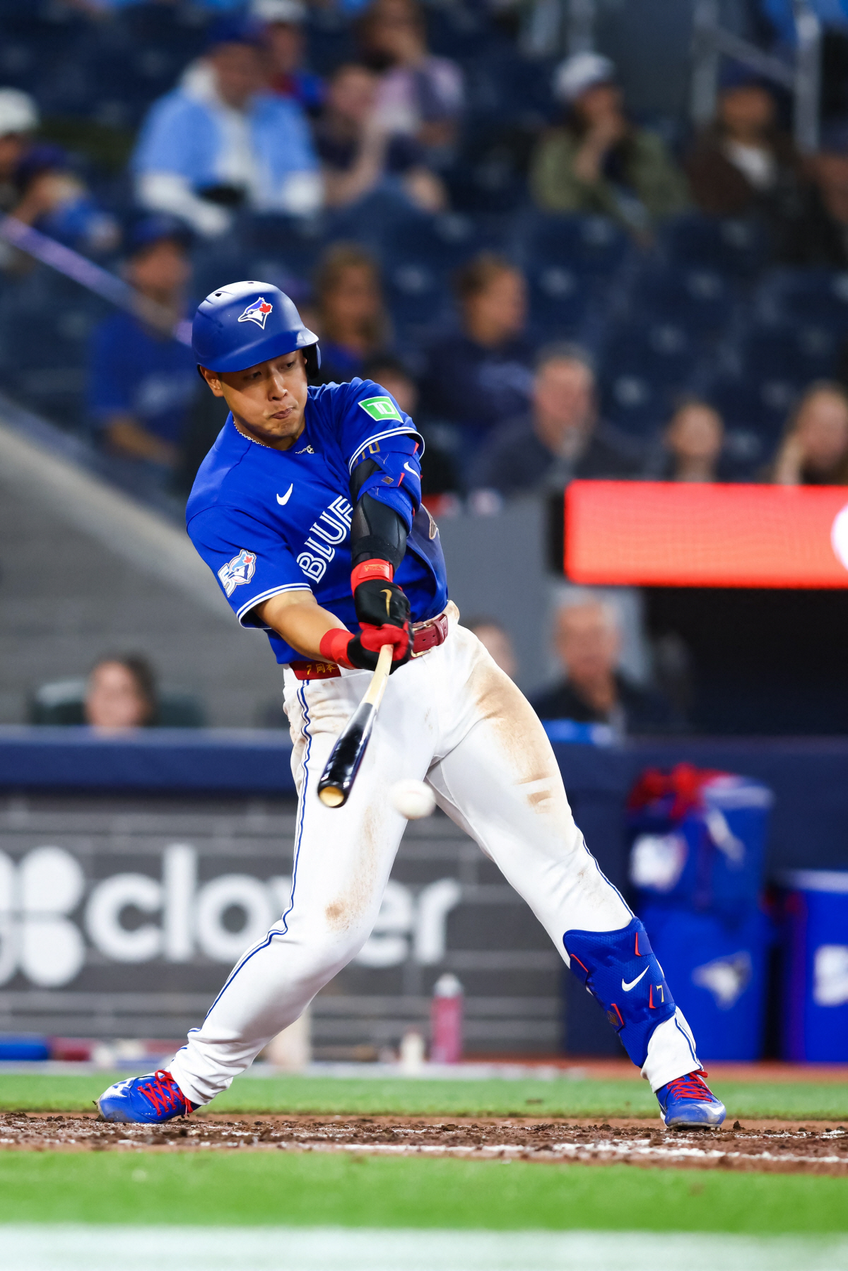TORONTO, CANADA - APRIL 12: Kazuma Okamoto #7 of the Toronto Blue Jays hits into a ground out in the ninth inning of their MLB game against the Minnesota Twins at Rogers Centre on April 12, 2026 in Toronto, Ontario, Canada. Cole Burston/Getty Images/AFP (Photo by Cole Burston / GETTY IMAGES NORTH AMERICA / Getty Images via AFP)