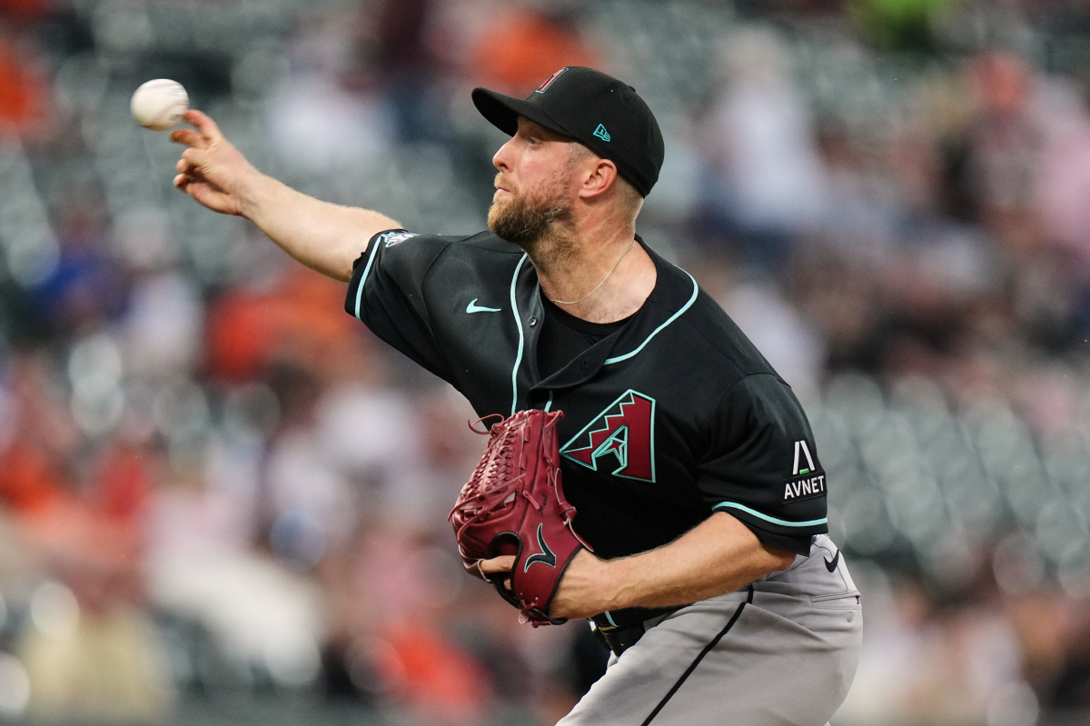 Arizona Diamondbacks starting pitcher Merrill Kelly delivers during the second inning of a baseball game against the Baltimore Orioles, Tuesday, April 14, 2026, in Baltimore. (AP Photo/Stephanie Scarbrough)