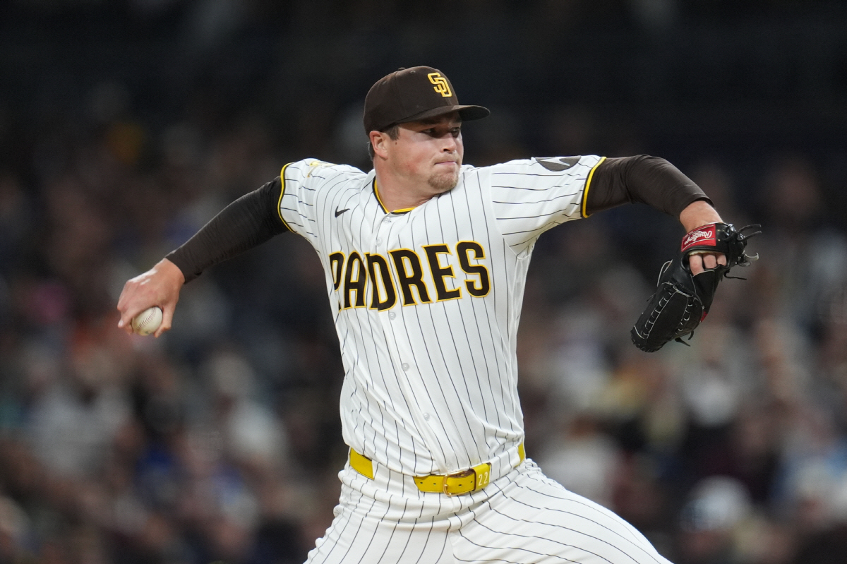 San Diego Padres pitcher Mason Miller works against a Seattle Mariners batter during the ninth inning of a baseball game Tuesday, April 14, 2026, in San Diego. (AP Photo/Gregory Bull)
