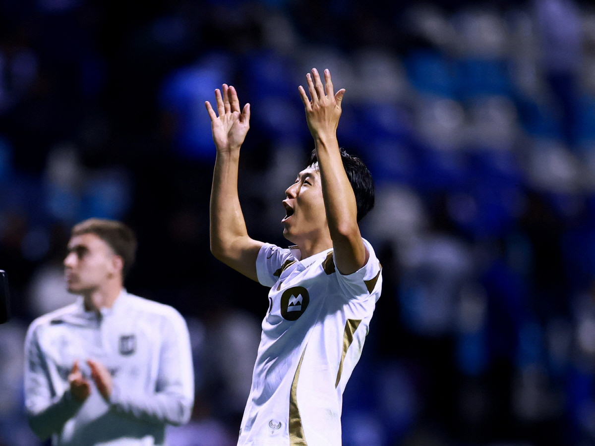 Soccer Football - CONCACAF Champions Cup - Quarter Final - Second Leg - Cruz Azul v Los Angeles FC - Estadio Cuauhtemoc, Puebla, Mexico - April 14, 2026 Los Angeles FC's Son Heung-Min celebrates after the match REUTERS/Eloisa Sanchez
