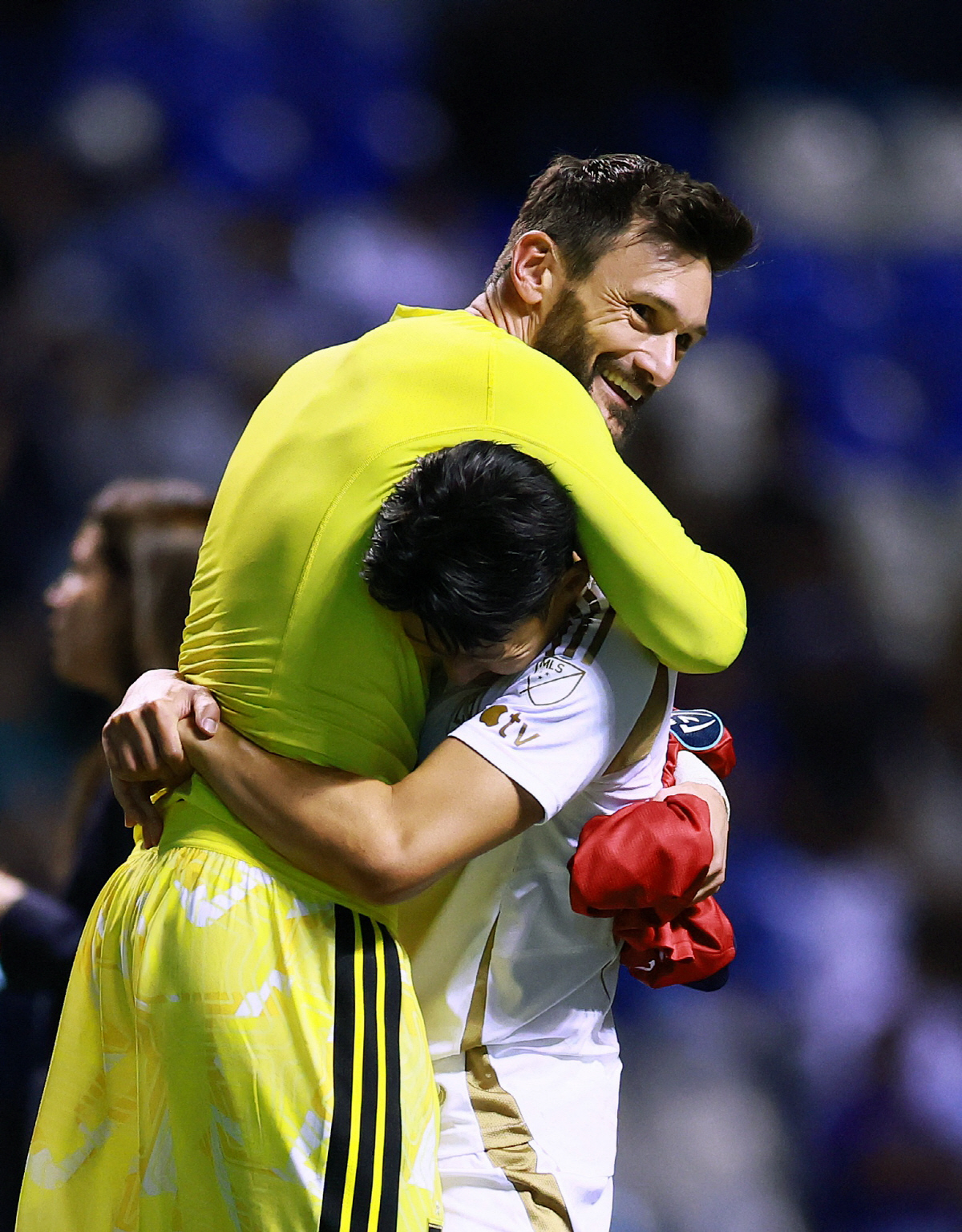 Soccer Football - CONCACAF Champions Cup - Quarter Final - Second Leg - Cruz Azul v Los Angeles FC - Estadio Cuauhtemoc, Puebla, Mexico - April 14, 2026 Los Angeles FC's Hugo Lloris and Son Heung-Min celebrate after the match REUTERS/Eloisa Sanchez