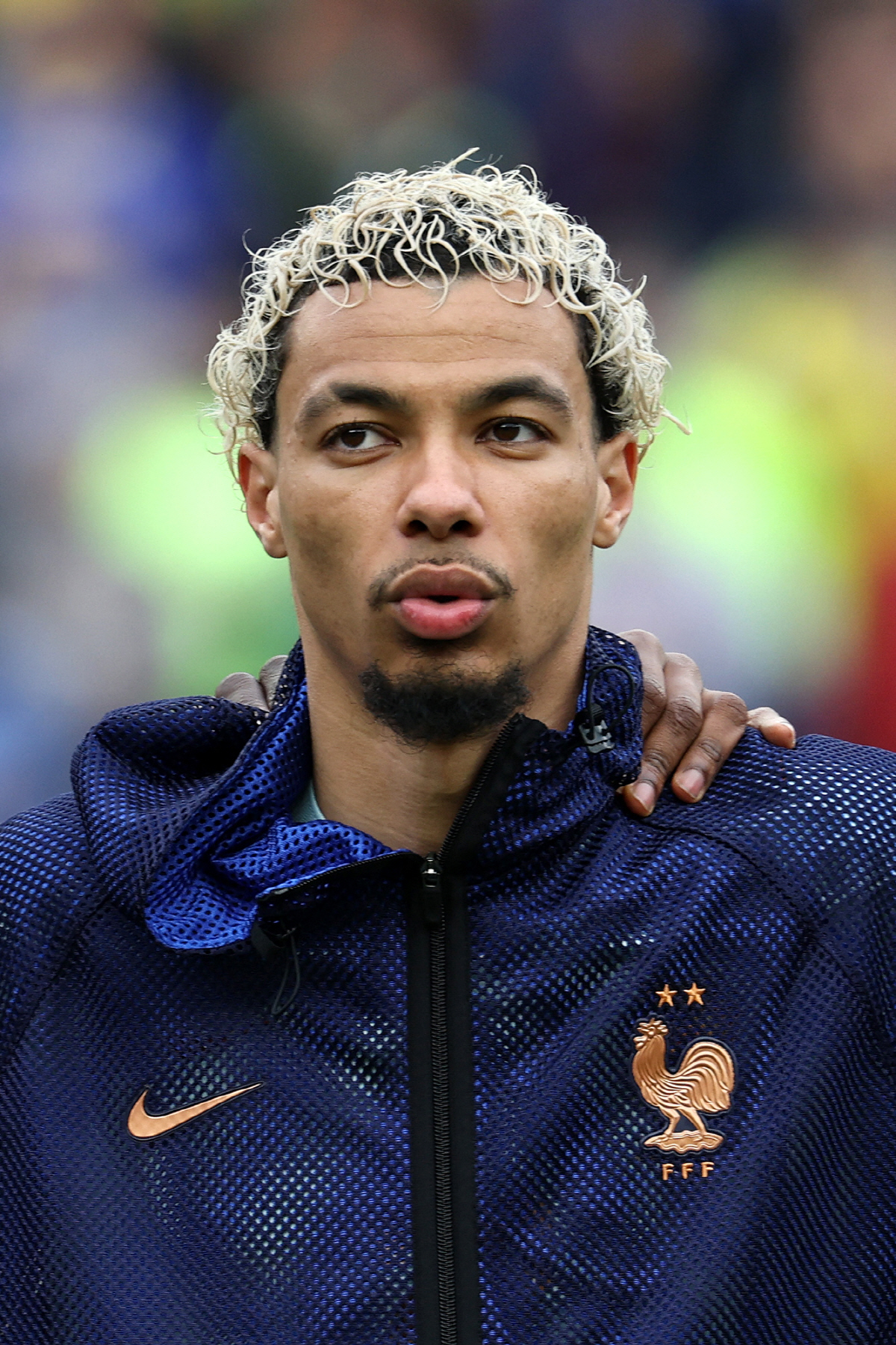 (FILES) France's forward #09 Hugo Ekitike stands for the national anthems ahead of a friendly football match between Brazil and France at Gillette Stadium in Foxborough, Massachusetts, on March 26, 2026. France coach Didier Deschamps confirmed on April 15, 2026, that the serious injury suffered by Liverpool forward Hugo Ekitike on April 14, 2026 in the Champions League match against PSG "will unfortunately prevent him from finishing the season with Liverpool and from participating in the World Cup." (Photo by FRANCK FIFE / AFP)