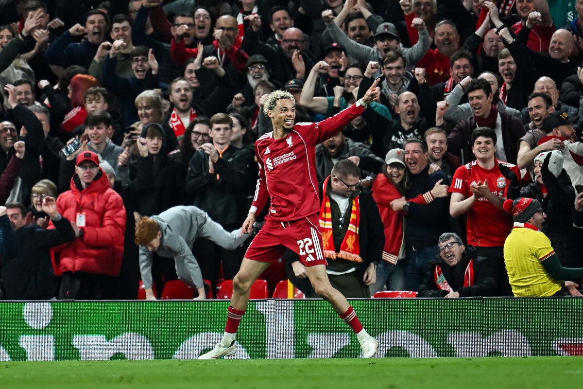 (FILES) Liverpool's French forward #22 Hugo Ekitike celebrates scoring his team's second goal during the UEFA Champions League, round of 16 second leg football match between Liverpool and Galatasaray at Anfield in Liverpool, north-west England on March 18, 2026. A rising star with a strong ?personality? at Reims, Hugo Ekitike subsequently struggled to make his mark at the star-studded PSG of the Mbappe-Neymar-Messi era, an experience he describes as ?complicated but necessary? for the brilliant Liverpool striker, who returns to the Parc des Princes on April 8, 2026. (Photo by Paul ELLIS / AFP)