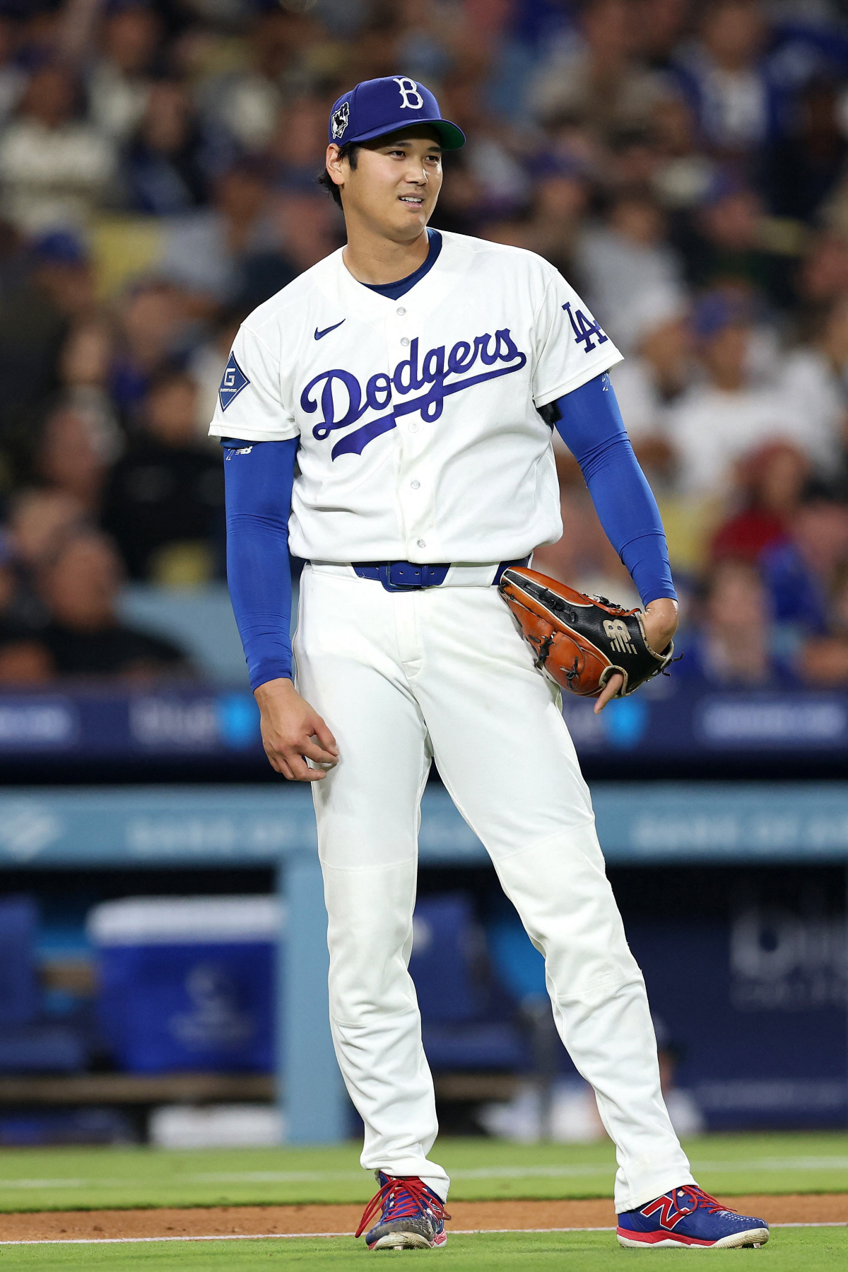 LOS ANGELES, CALIFORNIA - APRIL 15: Shohei Ohtani #17 of the Los Angeles Dodgers looks on against the New York Mets during the fifth inning at Dodger Stadium on April 15, 2026 in Los Angeles, California. All players are wearing the number 42 in honor of Jackie Robinson Day. Luke Hales/Getty Images/AFP (Photo by Luke Hales / GETTY IMAGES NORTH AMERICA / Getty Images via AFP)