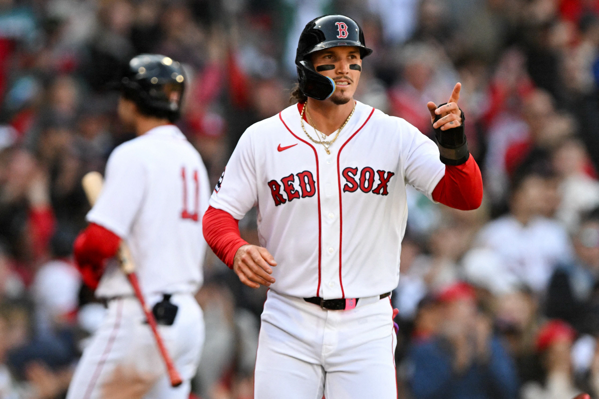 BOSTON, MASSACHUSETTS - APRIL 03: Jarren Duran #16 of the Boston Red Sox reacts after scoring on an RBI hit by third baseman Caleb Durbin (not seen) during the fourth inning of the home opener game against the San Diego Padres at Fenway Park on April 03, 2026 in Boston, Massachusetts. Brian Fluharty/Getty Images/AFP (Photo by Brian Fluharty / GETTY IMAGES NORTH AMERICA / Getty Images via AFP)