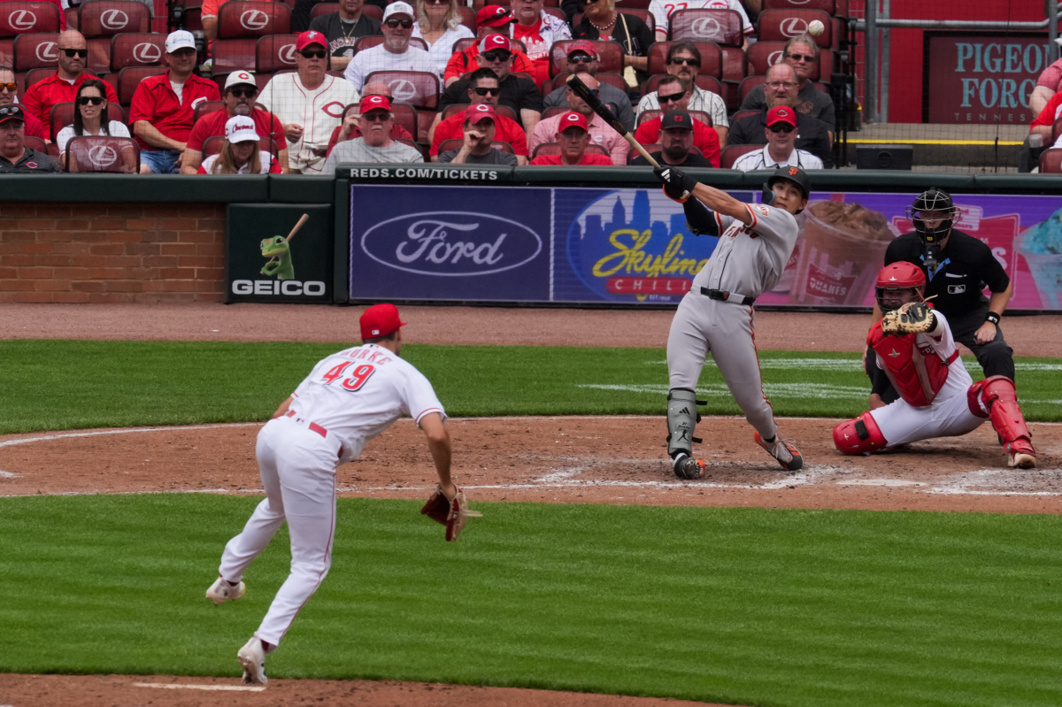 Apr 16, 2026; Cincinnati, Ohio, USA; San Francisco Giants center fielder Jung Hoo Lee (51) hits an RBI single against the Cincinnati Reds in the seventh inning at Great American Ball Park. Mandatory Credit: Aaron Doster-Imagn Images