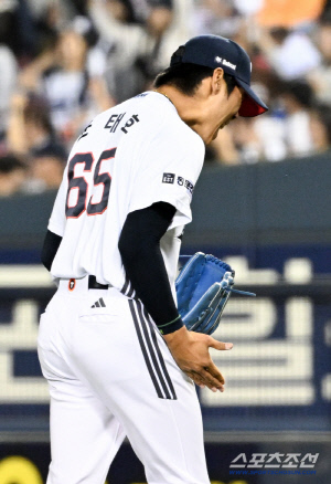 '시즌 첫 승' 윤태호, 무사만루 위기 무실점 호투…