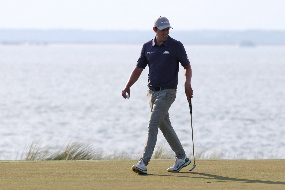 HILTON HEAD ISLAND, SOUTH CAROLINA - APRIL 18: Matthew Fitzpatrick of England looks on from the 18th green during the third round of the RBC Heritage 2026 at Harbour Town Golf Links on April 18, 2026 in Hilton Head Island, South Carolina. Kevin C. Cox/Getty Images/AFP (Photo by Kevin C. Cox / GETTY IMAGES NORTH AMERICA / Getty Images via AFP)