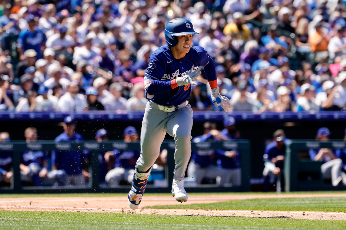 Apr 19, 2026; Denver, Colorado, USA; Los Angeles Dodgers shortstop Hyeseong Kim (6) runs on a double in the third inning against the Colorado Rockies at Coors Field. Mandatory Credit: Isaiah J. Downing-Imagn Images