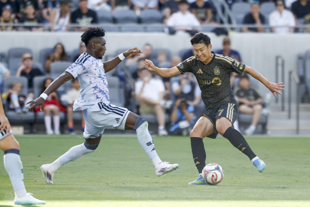 Apr 19, 2026; Los Angeles, California, USA; Los Angeles Football Club forward Son Heung-Min (7) kicks the ball during the first period against the San Jose Earthquakes at BMO Stadium. Mandatory Credit: William Navarro-Imagn Images