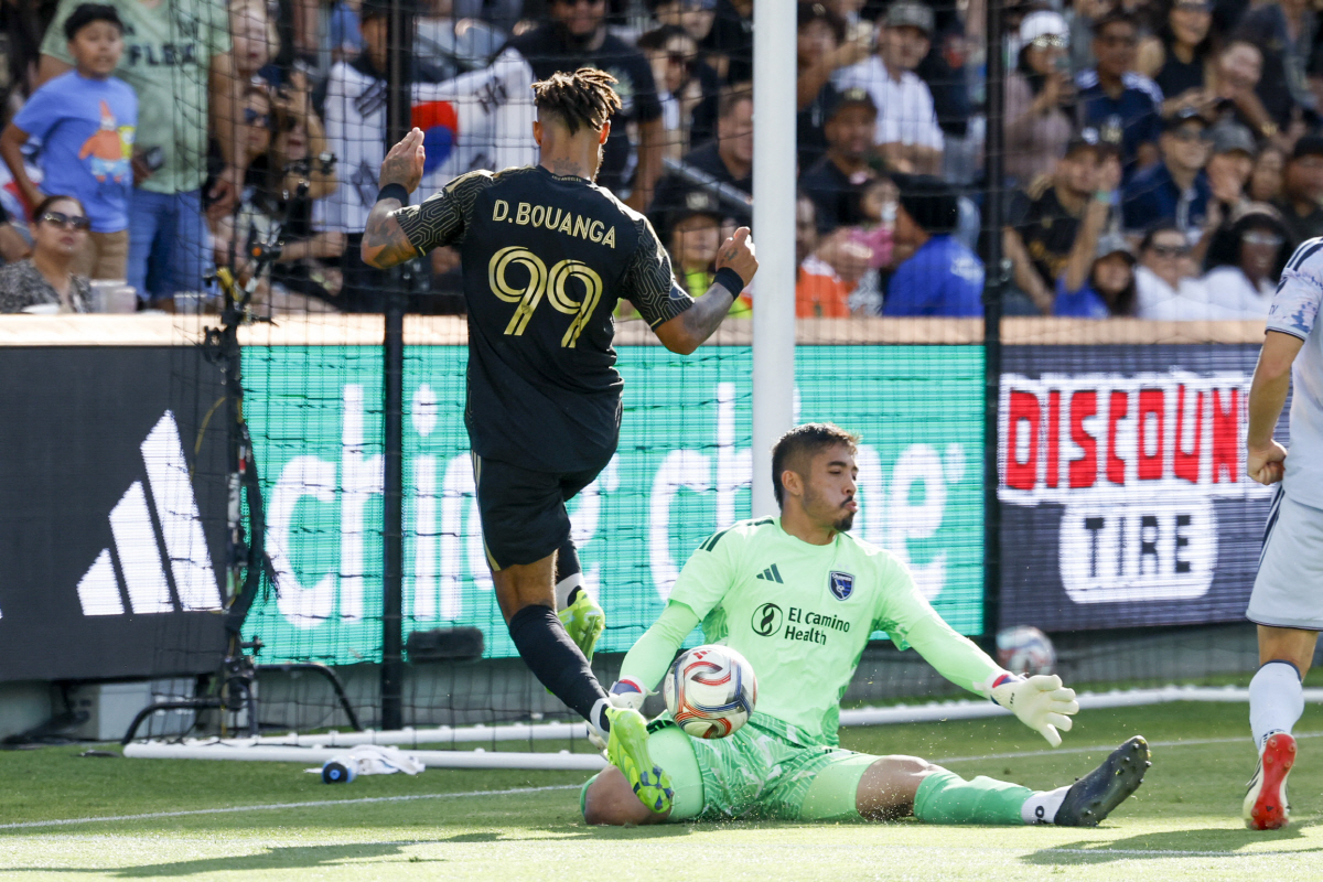 Apr 19, 2026; Los Angeles, California, USA; San Jose Earthquakes goalkeeper Daniel de Sousa Britto (42) makes a save after Los Angeles Football Club forward Denis Bouanga (99) kicks the ball at the goal during the first period at BMO Stadium. Mandatory Credit: William Navarro-Imagn Images