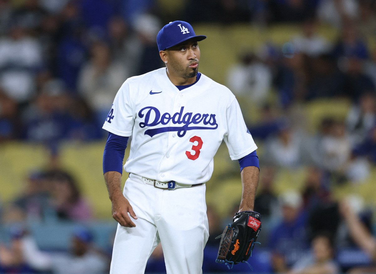LOS ANGELES, CALIFORNIA - APRIL 10: Edwin Diaz #3 of the Los Angeles Dodgers reacts after an RBI singe from Ezequiel Duran #20 of the Texas Rangers to score Sam Haggerty #0, to tie the game 7-7, during the ninth inning at Dodger Stadium on April 10, 2026 in Los Angeles, California. Harry How/Getty Images/AFP (Photo by Harry How / GETTY IMAGES NORTH AMERICA / Getty Images via AFP)