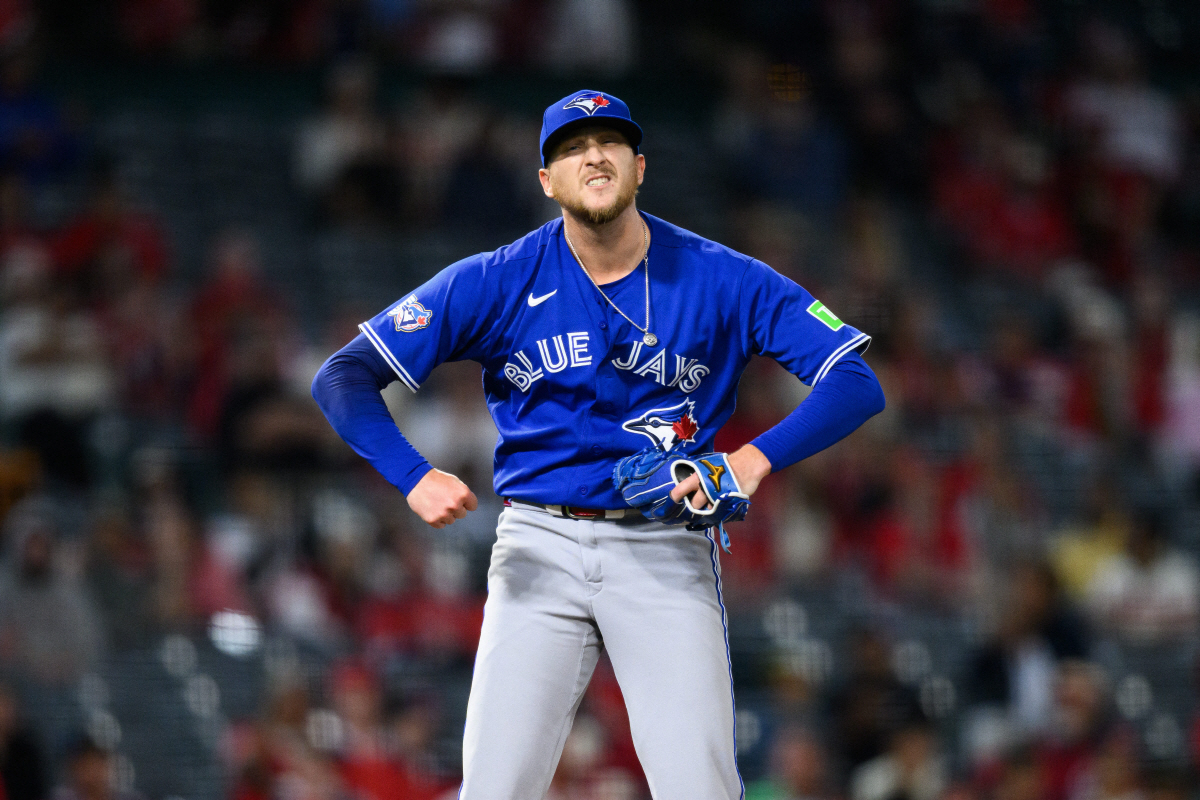Apr 20, 2026; Anaheim, California, USA; Toronto Blue Jays pitcher Jeff Hoffman (23) reacts after striking out Los Angeles Angels second baseman Adam Frazier (20) during the ninth inning at Angel Stadium. Mandatory Credit: William Liang-Imagn Images