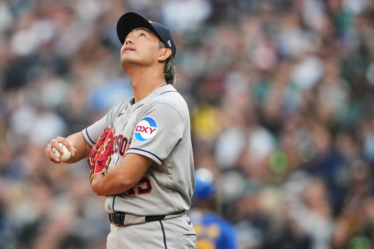 Houston Astros starting pitcher Tatsuya Imai reacts after allowing a single against Seattle Mariners' Julio Rodriguez during the first inning of a baseball game, Friday, April 10, 2026, in Seattle. (AP Photo/Lindsey Wasson)
