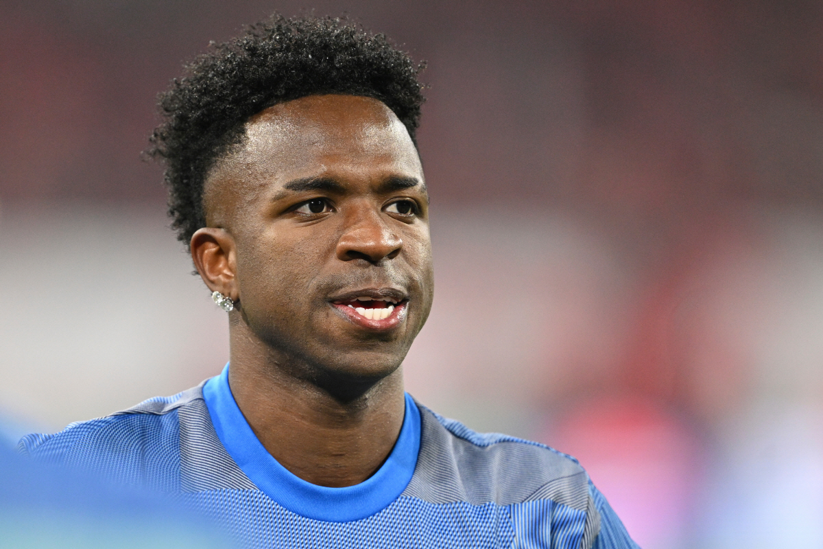 Real Madrid's Vinicius Junior warms up prior to the start of the Champions League quarterfinal second leg soccer match between Bayern Munich and Real Madrid in Munich, Germany, Wednesday, April 15, 2026. (AP Photo/Lennart Preiss)
