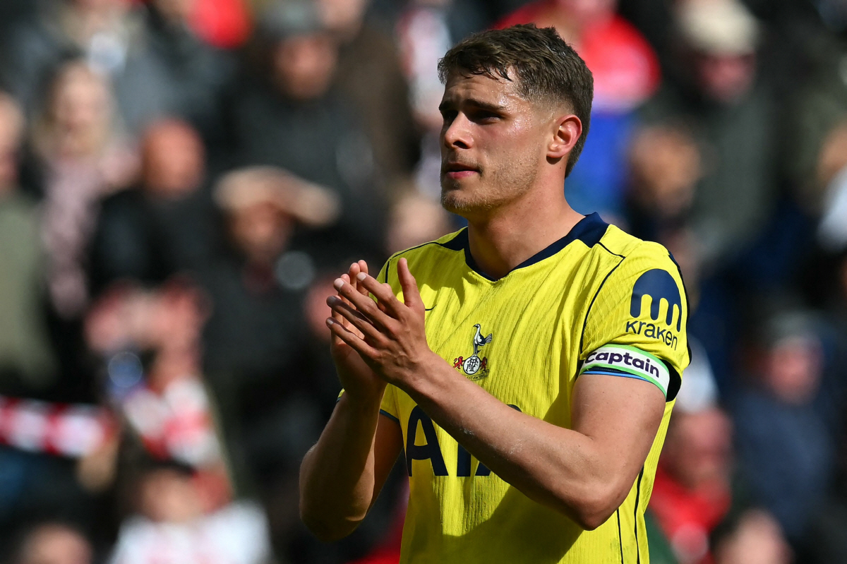 Tottenham Hotspur's Dutch defender #37 Micky van de Ven applauds fans on the pitch after the English Premier League football match between Sunderland and Tottenham Hotspur at The Stadium of Light in Sunderland in north east England on April 12, 2026. Sunderland won the game 1-0. (Photo by ANDY BUCHANAN / AFP) / RESTRICTED TO EDITORIAL USE. No use with unauthorized audio, video, data, fixture lists, club/league logos or 'live' services. Online in-match use limited to 120 images. An additional 40 images may be used in extra time. No video emulation. Social media in-match use limited to 120 images. An additional 40 images may be used in extra time. No use in betting publications, games or single club/league/player publications. /