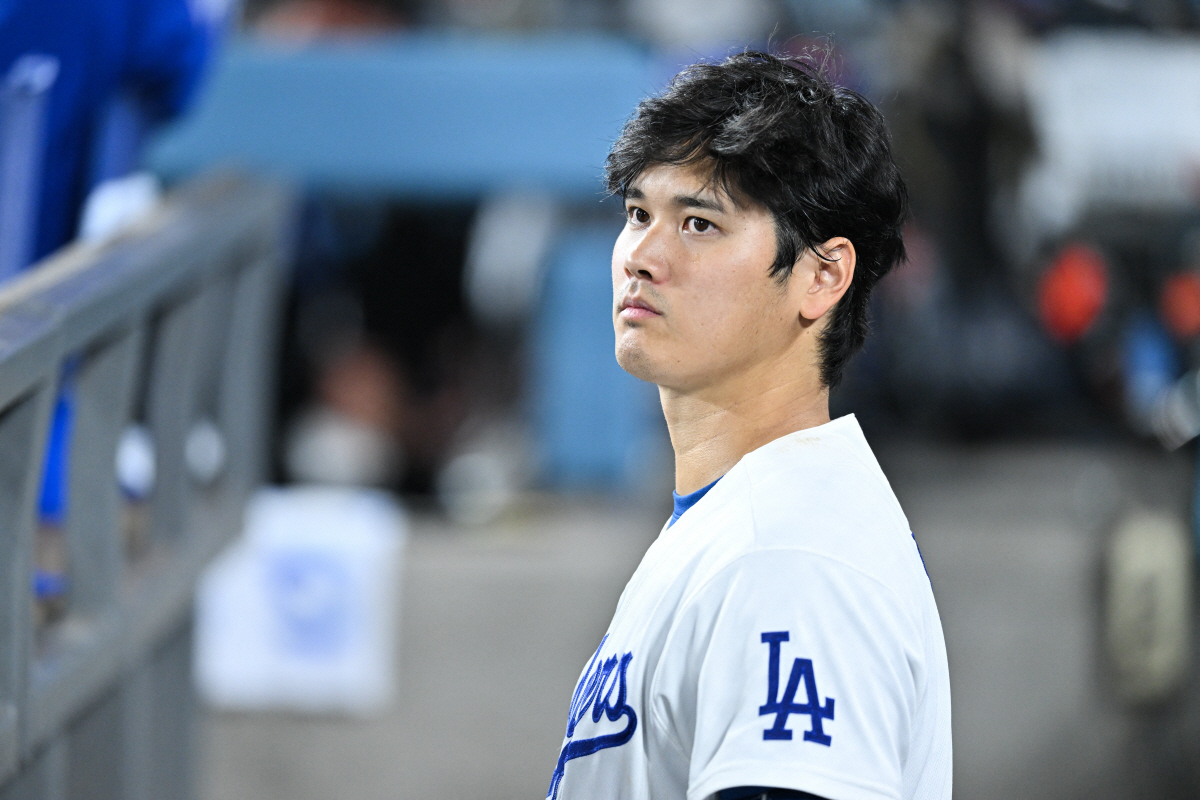 Apr 24, 2026; Los Angeles, California, USA; Los Angeles Dodgers two-way player Shohei Ohtani (17) looks on during the seventh inning against the Chicago Cubs at Dodger Stadium. Mandatory Credit: William Liang-Imagn Images