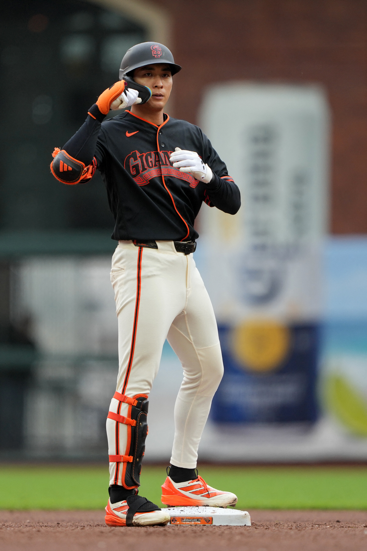Apr 25, 2026; San Francisco, California, USA; San Francisco Giants right fielder Jung Hoo Lee (51) gestures after hitting a double against the Miami Marlins during the fourth inning at Oracle Park. Mandatory Credit: Darren Yamashita-Imagn Images