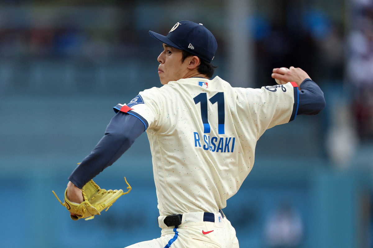 LOS ANGELES, CALIFORNIA - APRIL 25: Roki Sasaki #11 of the Los Angeles Dodgers pitches against the Chicago Cubs during the first inning at Dodger Stadium on April 25, 2026 in Los Angeles, California. Harry How/Getty Images/AFP (Photo by Harry How / GETTY IMAGES NORTH AMERICA / Getty Images via AFP)