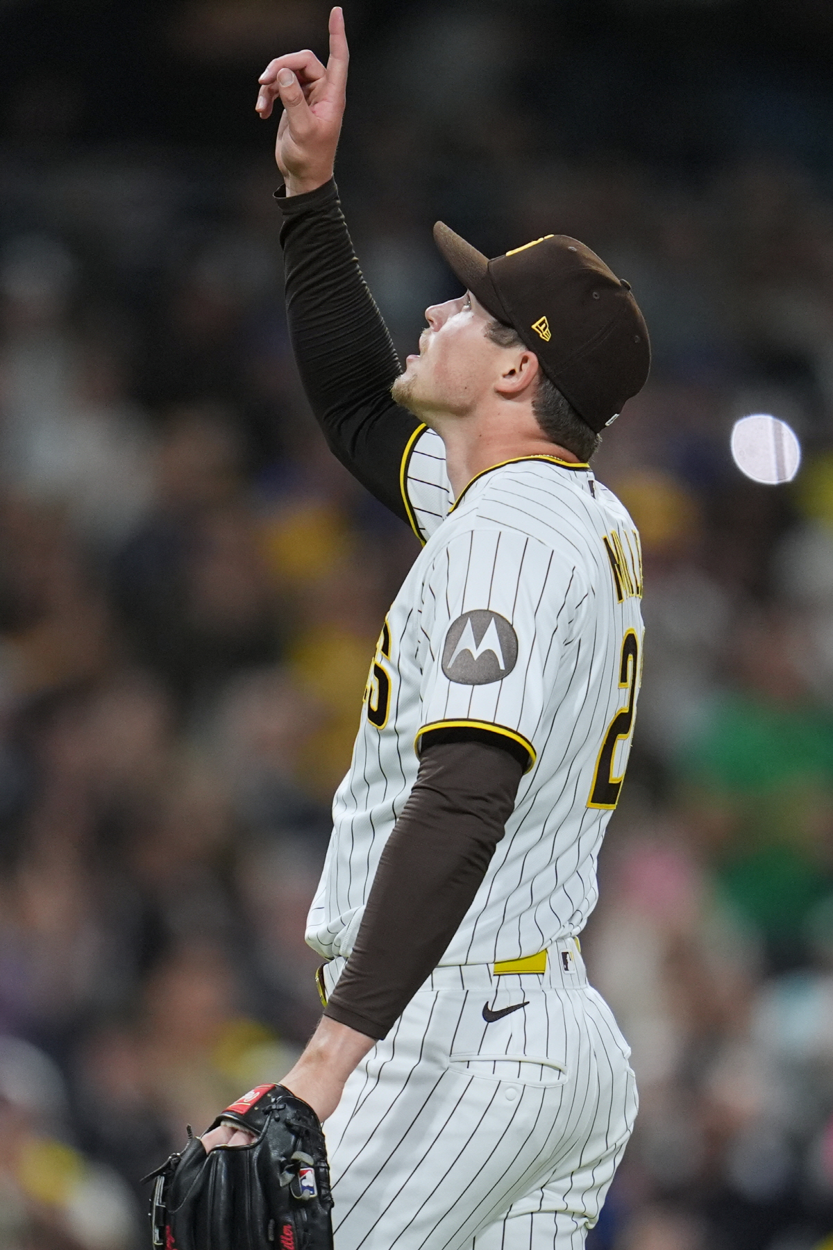 San Diego Padres pitcher Mason Miller celebrates after the Padres defeated the Seattle Mariners 5-2 in a baseball game Thursday, April 16, 2026, in San Diego. (AP Photo/Gregory Bull)